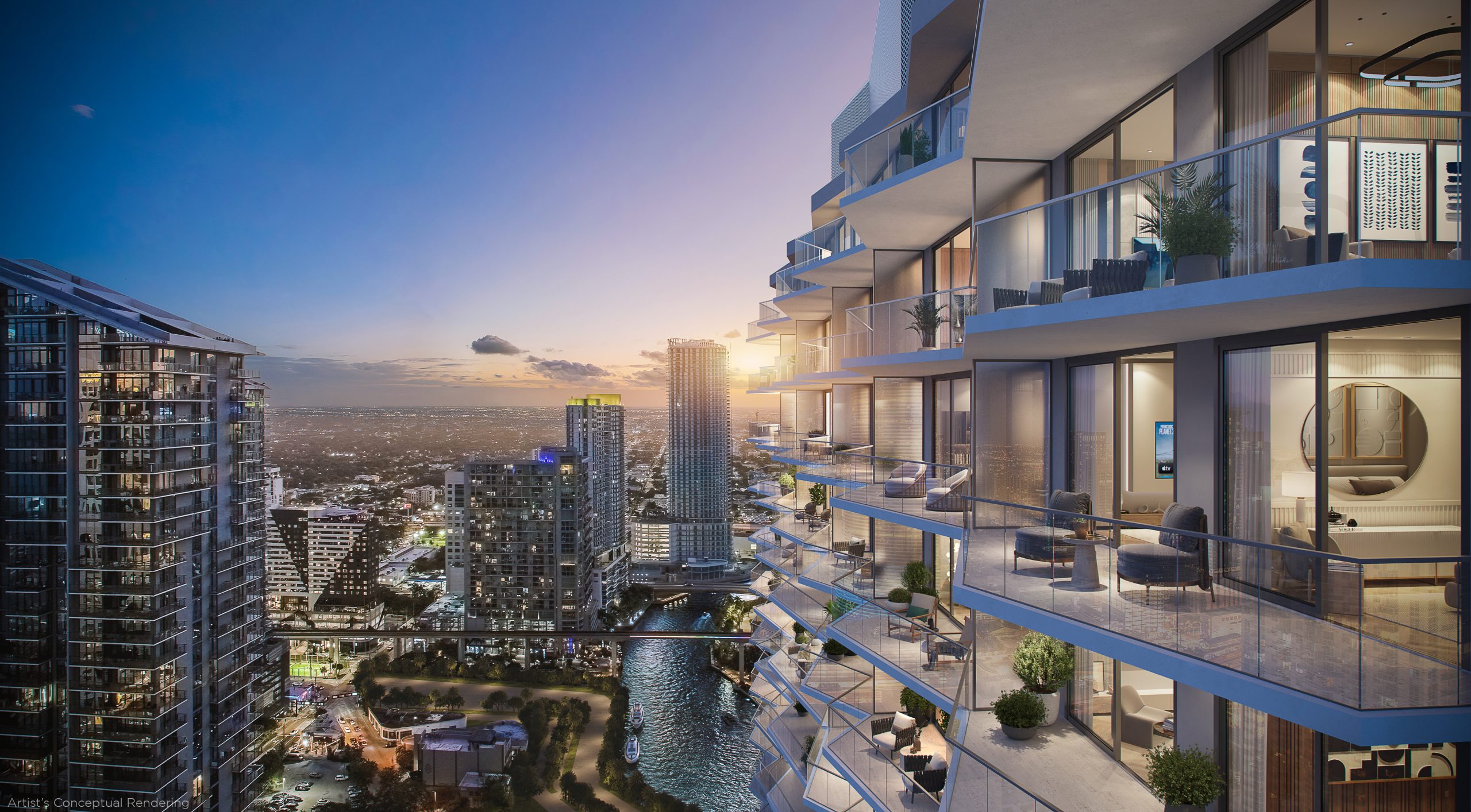 Dusk view of the Viceroy Brickell south facade overlooking the Miami River with luxury balconies and the city skyline in the background.